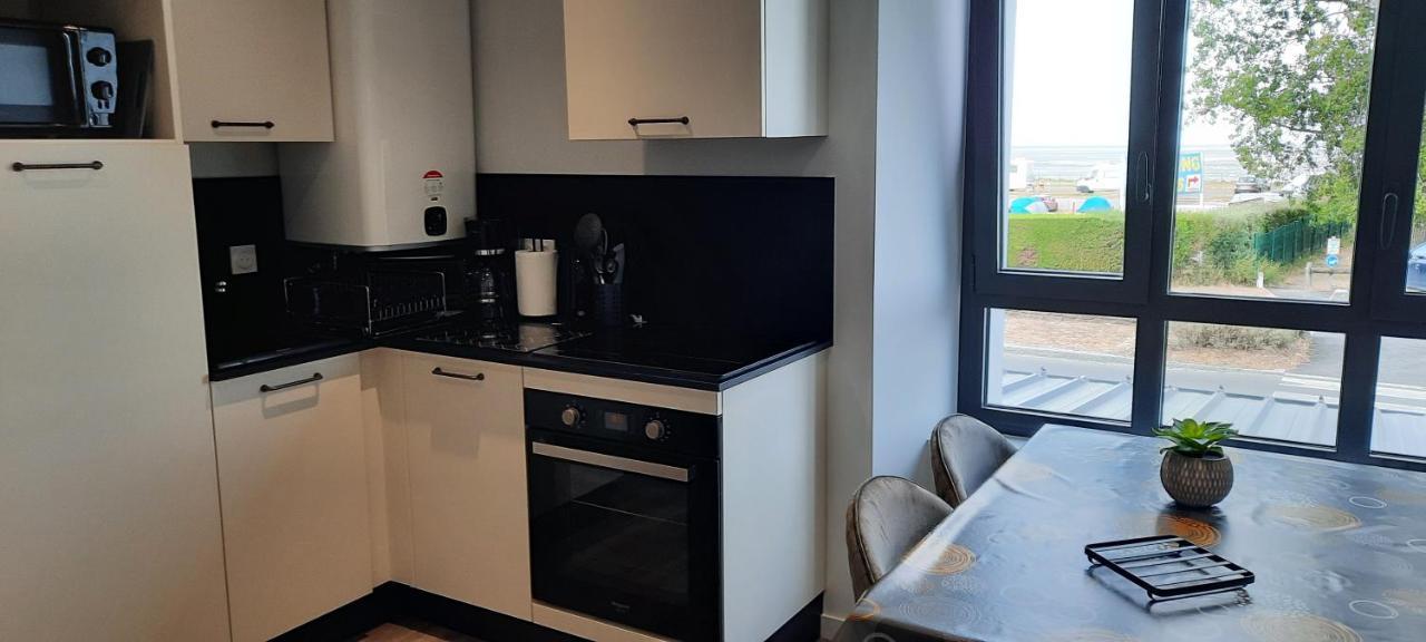 Les Appartements De La B Saint-Benoît-des-Ondes Exterior foto